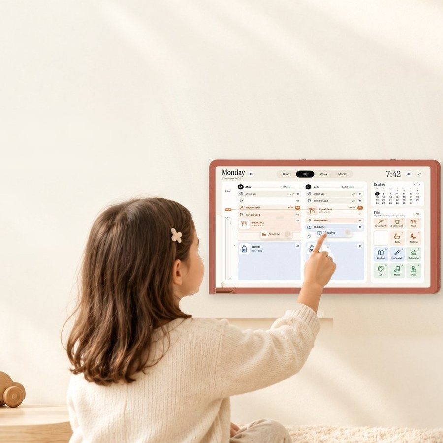 A girl drags a task card into her morning on the CURI TIME BOX wall calendar